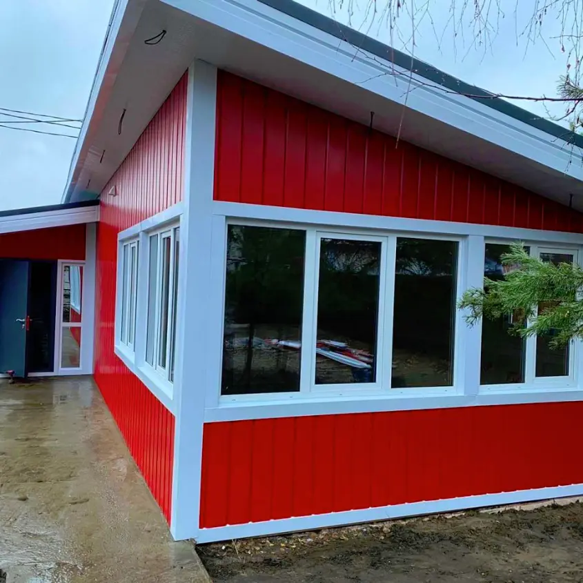 Фото 8 МеталлоСайдинг Евро-Брус под брус RAL3020 Красный вертикальный монтаж на фасаде